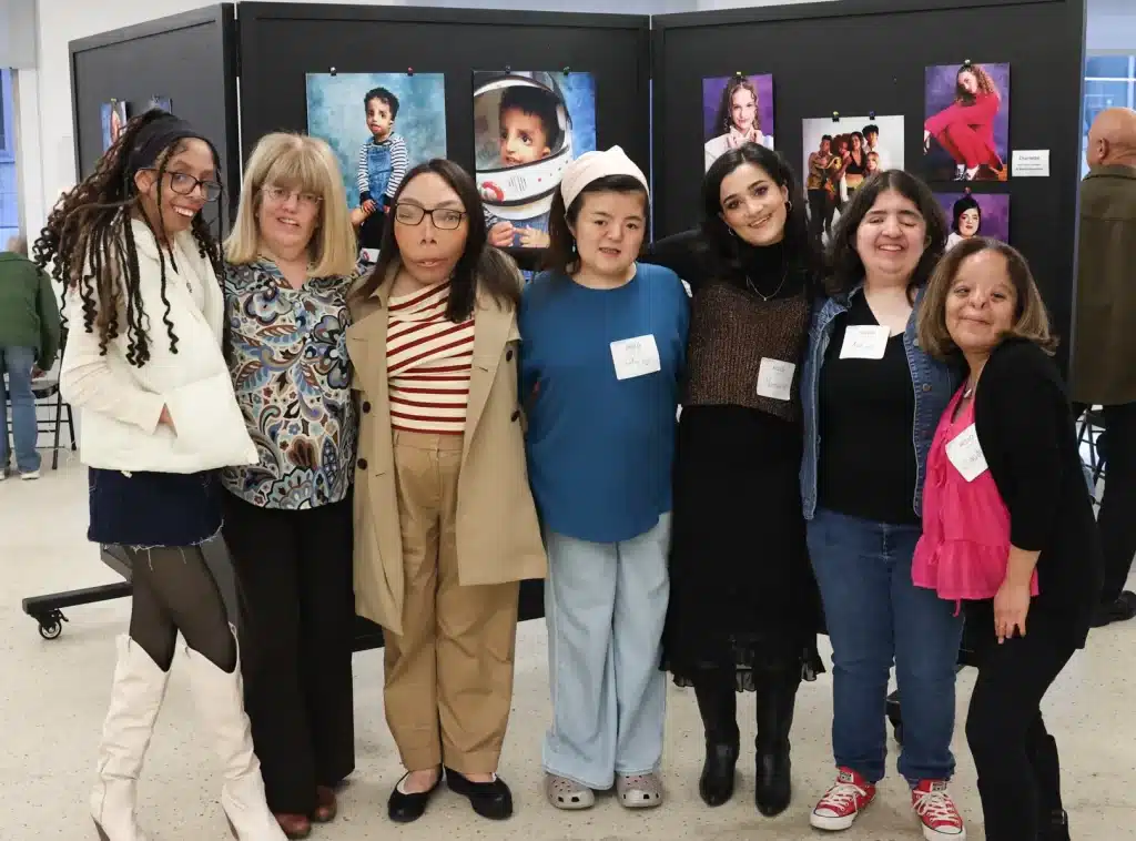 myFace Community Members Anibel, Dina, Bridgett, Lily, Naomi, Ava, and Claudia at the exhibit.